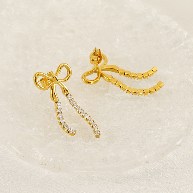 Pendientes de borla con lazo largo de acero inoxidable europeo y americano estilo INS Pendientes de diamantes de tendencia de personalidad dorada femenina al por mayor