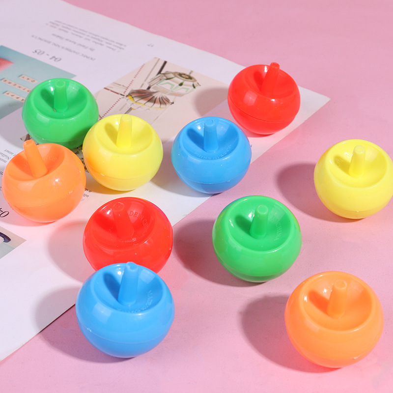 Mercado nocturno de Qiankun invertido, giroscopio, mini giratorio de manos, pequeño puesto de juguetes giratorio, juguetes para niños, giroscopio de manzana