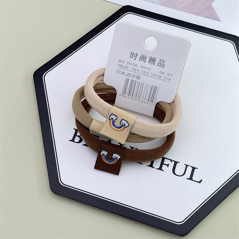 2022 nuevo estilo coreano accesorios para el cabello leche té color Banda para el cabello sin costuras etiqueta de tela Linda cuerda para el cabello 3 tarjetas cabeza cuerda banda de goma