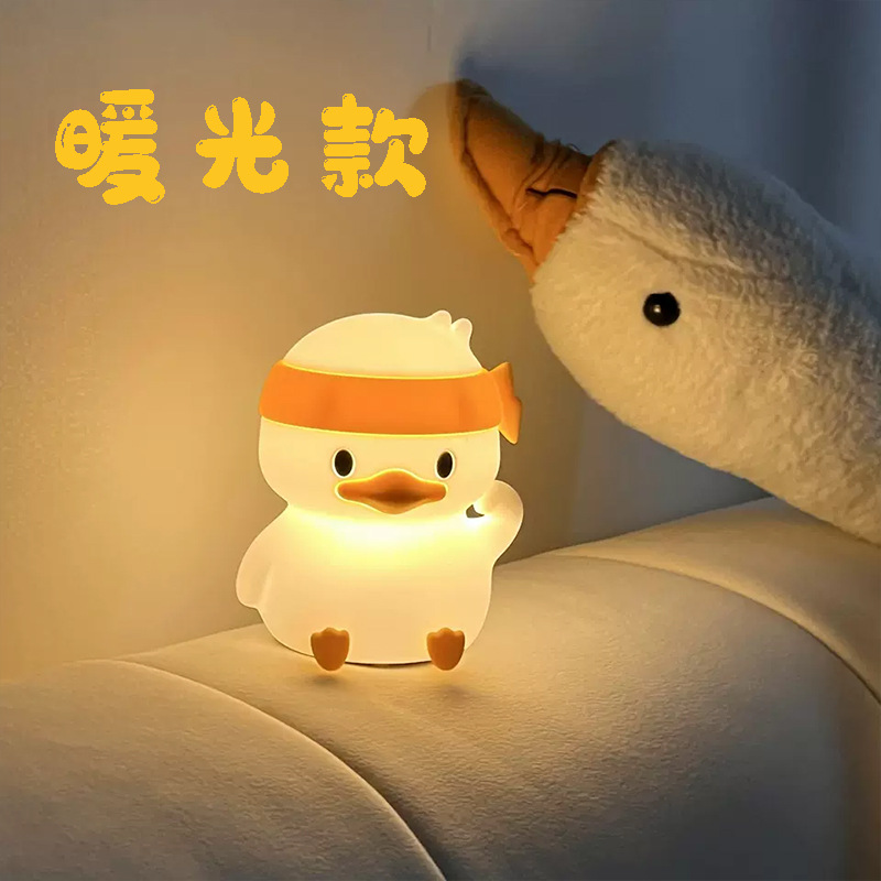 Explosión transfronteriza pato ambiente lámpara de noche dormitorio dormida luz suave lámpara de silicona lámpara de inducción