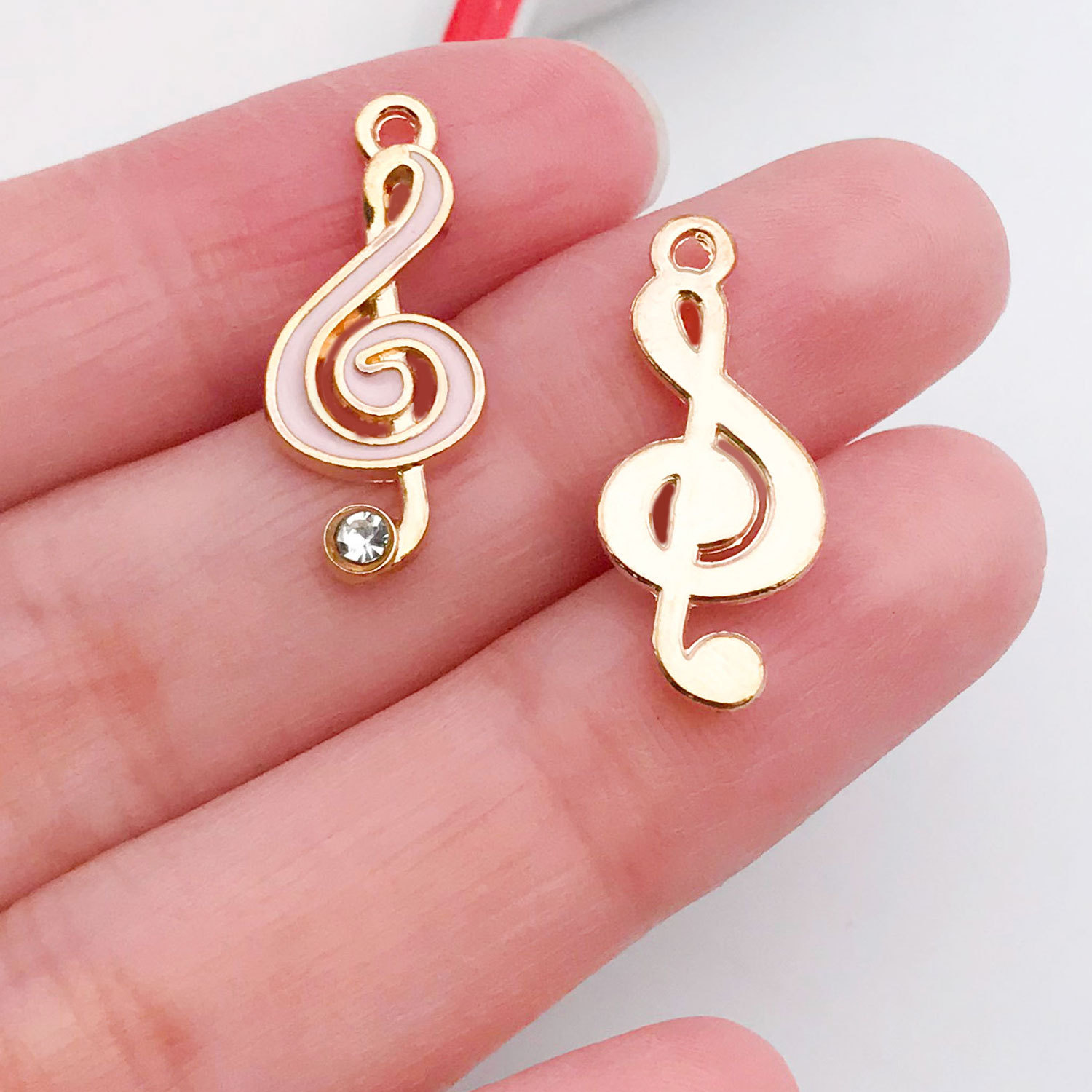 19596J-粉色滴油点钻音符音乐符号22x10mm-0.8