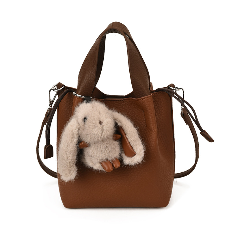 Bolso de mano retro de alto nivel, bolso de balde de agua universal para mujeres 2025, nuevo estilo coreano de invierno para niños y madres, bolso de hombro.