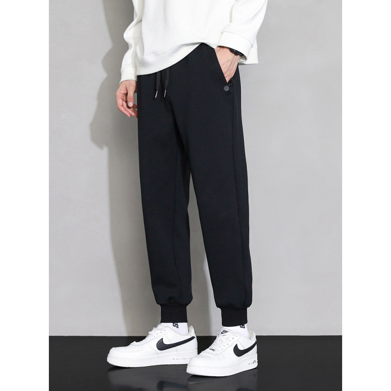 Pantalones deportivos de algodón de invierno y otoño más gruesos para hombres sueltos y versátiles, pantalones casuales de primavera