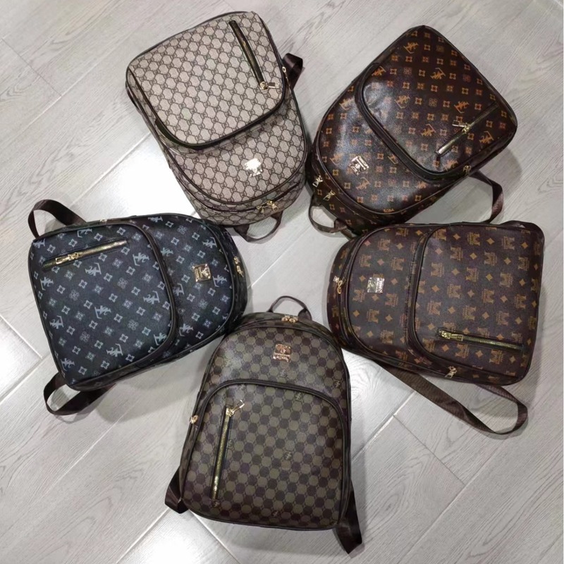 卸売りの新型女性の経典のレトロなリュックサックの格子の図案のpuのリュックサックの軽やかな女子学生の通勤するかばん|undefined