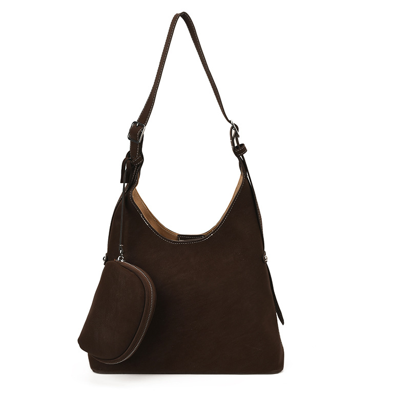 Bolso relajado coreano de cuero suave retrógrado para mujeres bolso de cubo de gran capacidad 2025 nuevo hombro bajo la braza bolso mochila