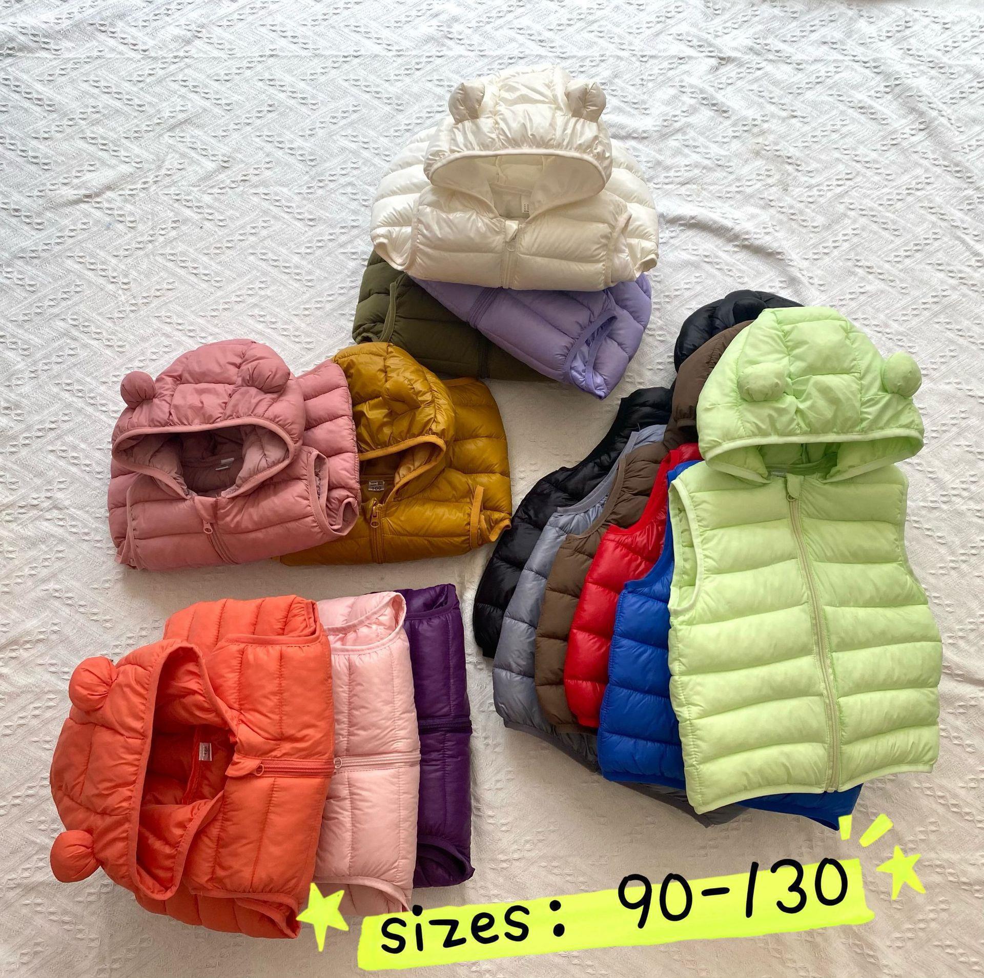 Chaleco de algodón con capuchón de color sólido chaleco de algodón de pluma para niños y niñas lindos y delgados hombros primavera y otoño caliente dentro y fuera