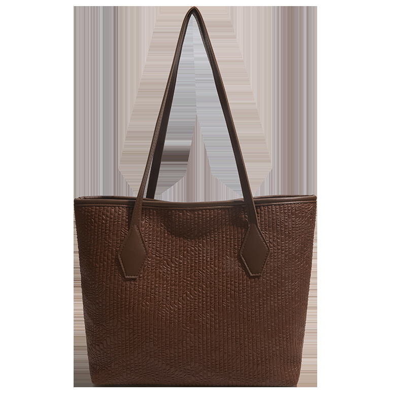 Bolsa de gran capacidad para mujeres 2026 nuevo estilo extranjero tejido de hombro brazo bolso de mano para salir bolsa de viaje