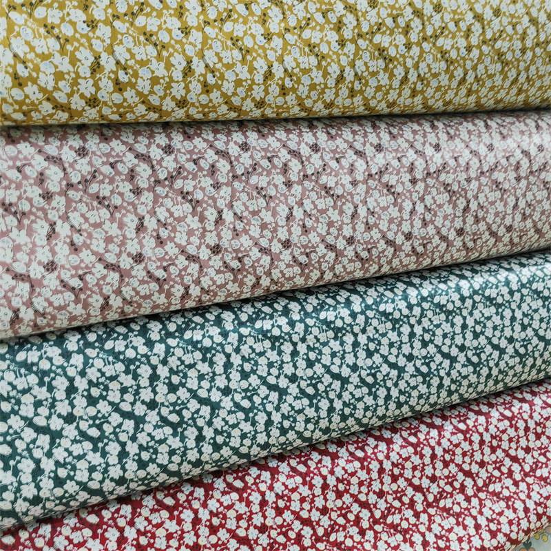 批发南通小卡通服装纯棉布料 婴童床品服装面料 春夏碎花斜纹棉布