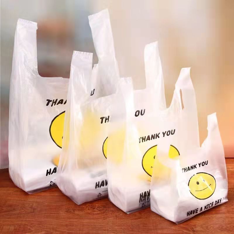 厂家直销塑料背心袋子批发透明笑脸手提马甲包装袋外卖快餐打包袋
