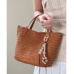 手工真皮编织包女2025新款度假风手提小众托特包女包斜挎水桶包