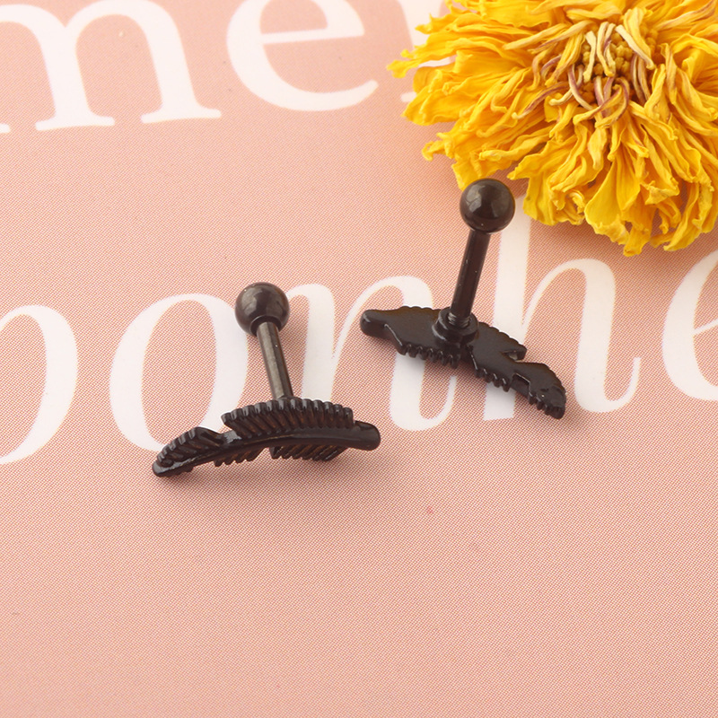 Silver pointed spike labret stud material detail