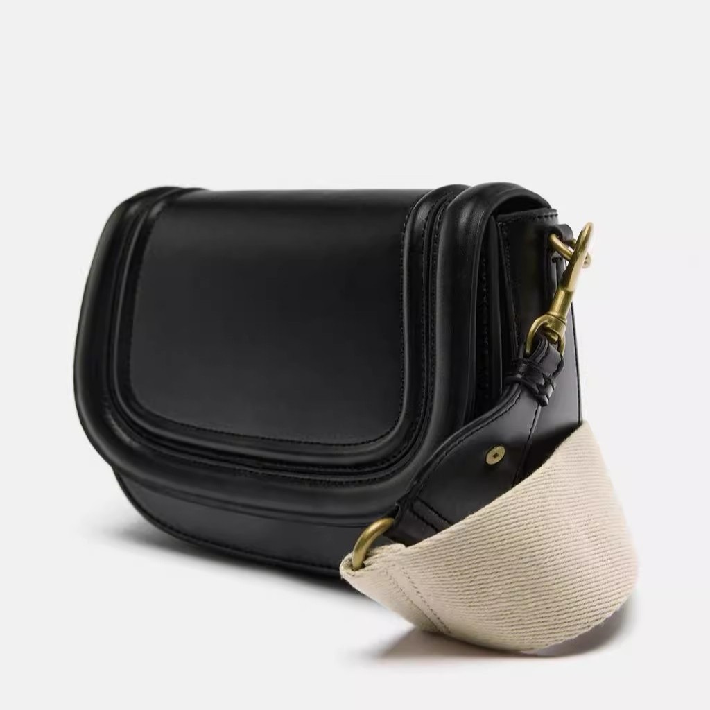 스페인 여성 가방 2024 새로운 안장 가방 마그네틱 버클 플립 라인 장식 크로스 바디 백 크로스 국경 원피스 헤어