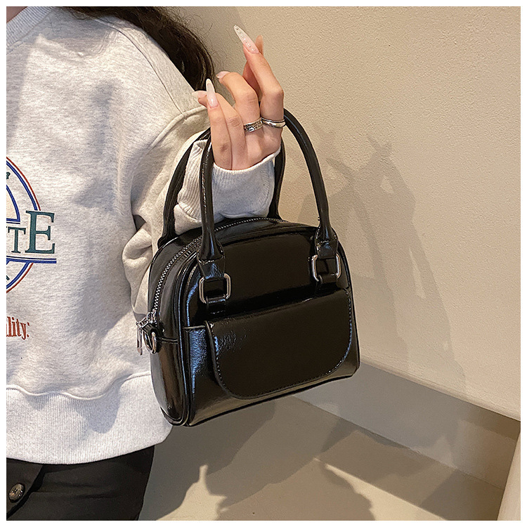 大衆デザインのシンプルなハンドバッグのレトロなバッグの洋風の明るい顔のショルダーバッグは日常的に通勤しています。|undefined