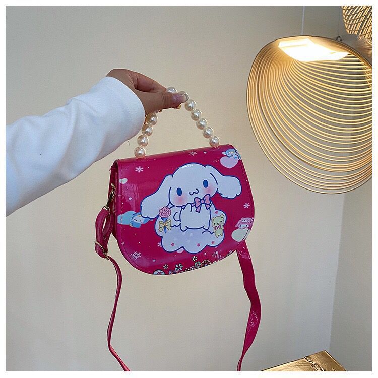 2024 nueva bolsa de hombro para niños princesa Elsa dibujos animados Yue Gui perro coreano nicho perla bolsa de mano inclinada