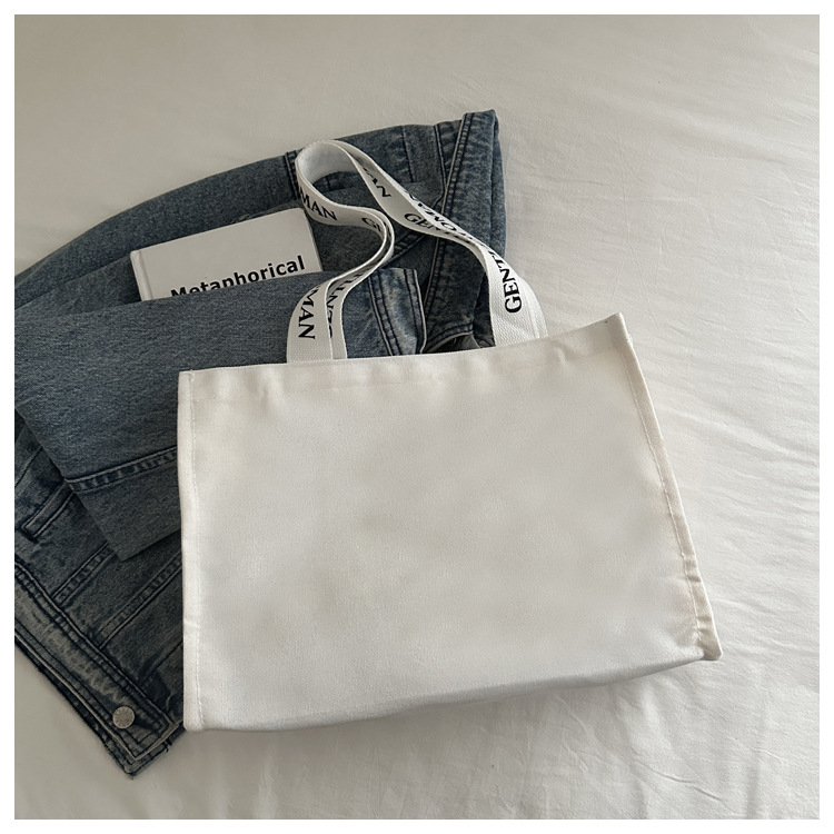 Large-capacity letter canvas bag 2025 new style ins printed versatile shoulder bag for commuting and portable ladies' tote bag undefined