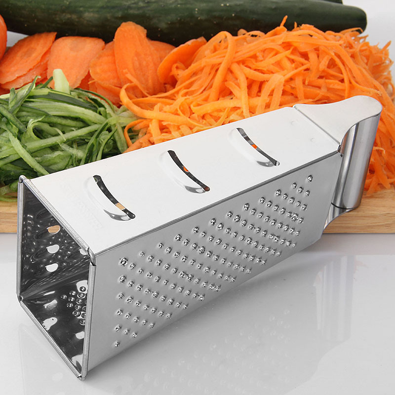 Mayorista de 8 pulgadas cuatro lados raspador cortador de verduras multifuncional cortador de papas de acero inoxidable raspador de piel en stock