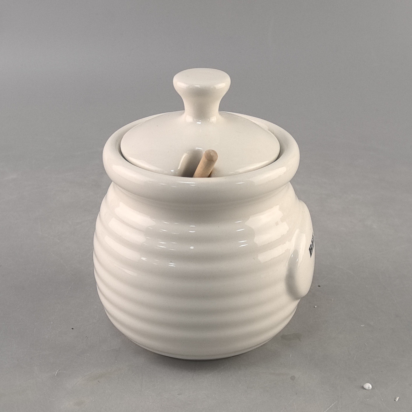Creativo de alto valor visual de cerámica simple lata de manteca de cerdo cocina resistente a altas temperaturas con tapa lata de condimentos casera lata de miel lata de almacenamiento