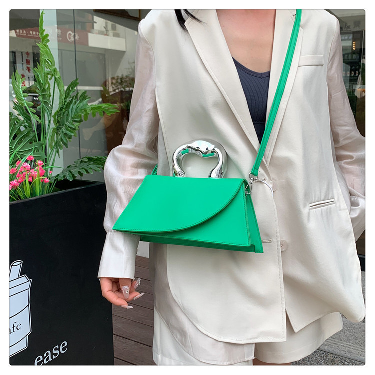 Nicho francés popular bolso de color sólido bolso de mujer 2024 verano nuevo estilo simple ocio red mochila de hombro