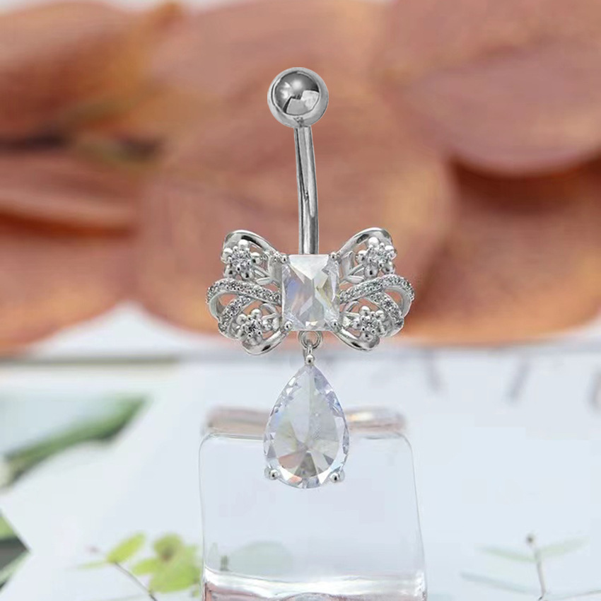 Piercing ombelico zircone con pendente a cuore e fiocco gioiello_voghion.com