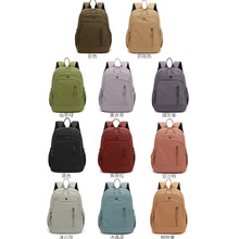 新款纯色中性双肩包极简风大容量背包多隔层通勤休闲包学生书包