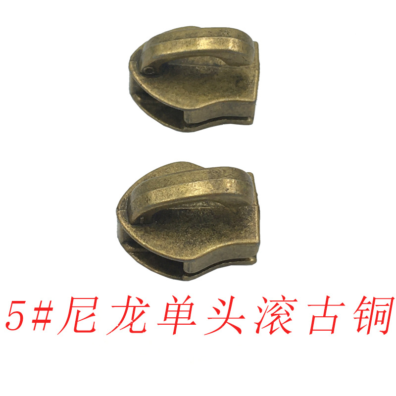 En stock al por mayor N ° 3 N ° 5 N ° 10 dientes de goma de nylon elefante nariz de una sola cabeza equipaje cabeza colgante chapado rodillo chapado multi-color