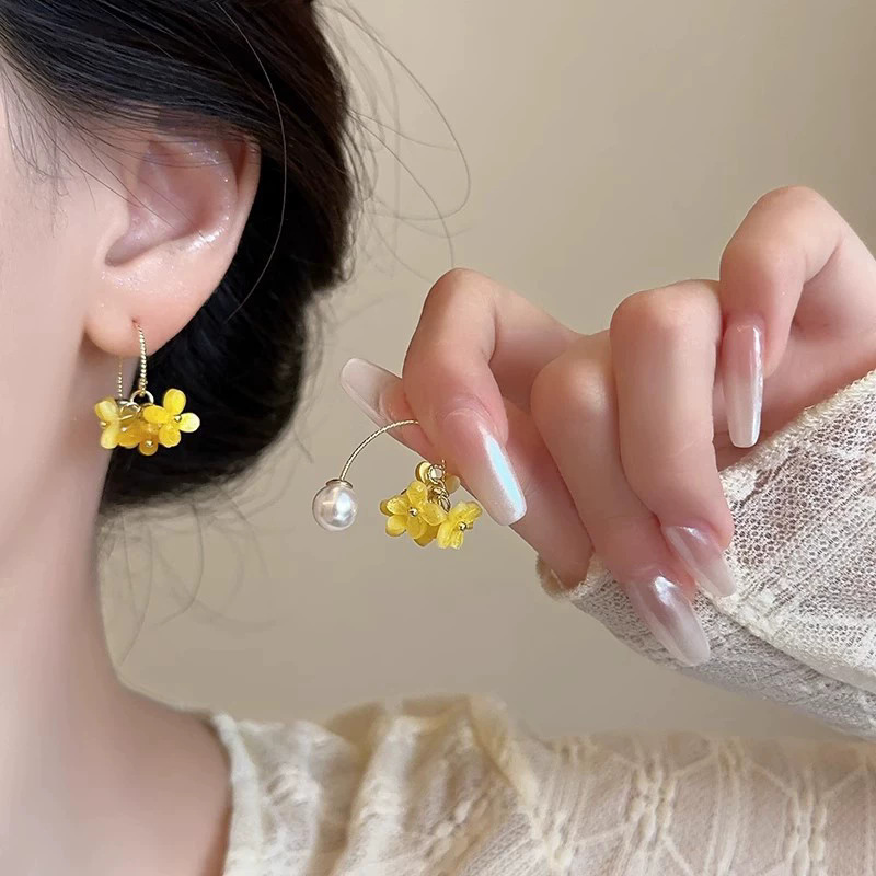 2026 viento falso sensación de atmósfera super inmortal pendientes de flores de malla temperamento suave de chiffon para mujeres pendientes