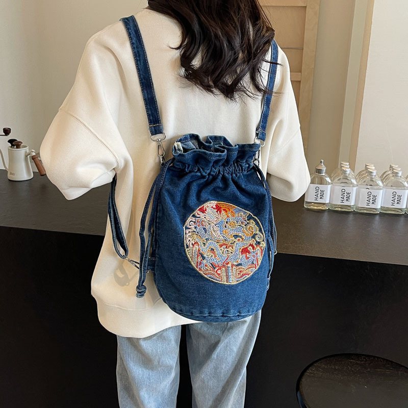 2024 nueva mochila bordada de estilo chino bolso de hombro de mezclilla casual transfronterizo bolso de mensajero personalizado bolso de cubo