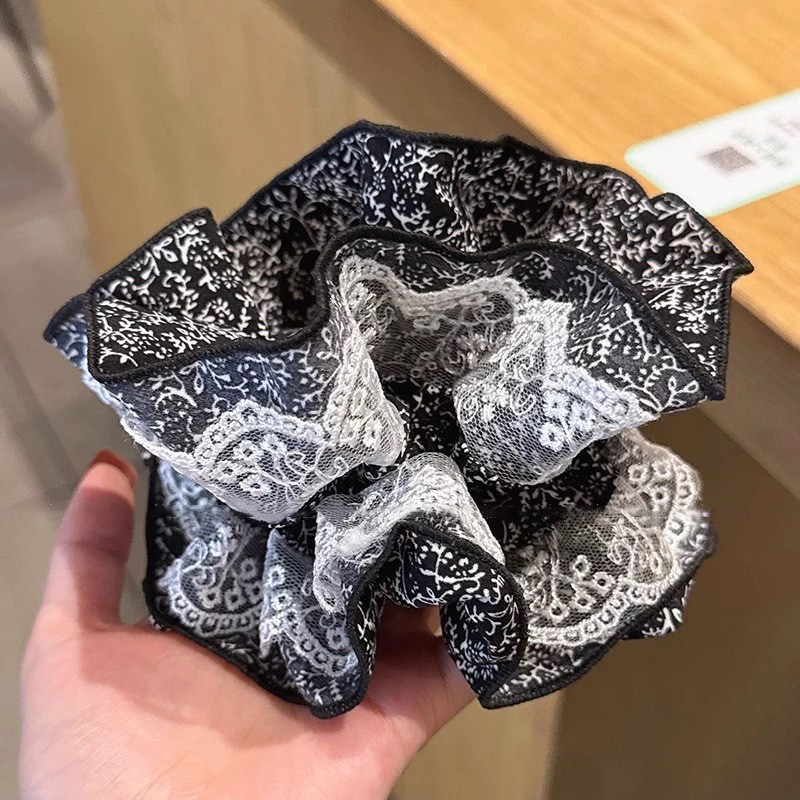 Pastoral viento intestino anillo de cabello mujer 2025 nuevo estilo de alta sensación bola de cabello cuerda de cabeza flor dulce princesa adornos de cabello cuerda