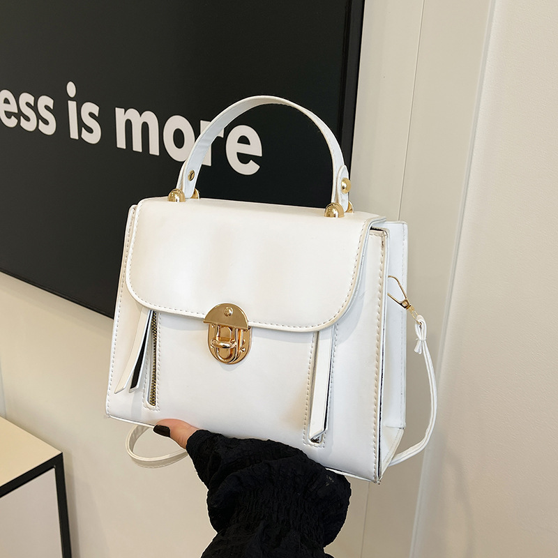 Moda, atmósfera, bolso de hombro simple, primavera 2025, nuevo estilo, bolso de mensajero para mujer, bolso cuadrado con cerradura de personalidad retro, marea