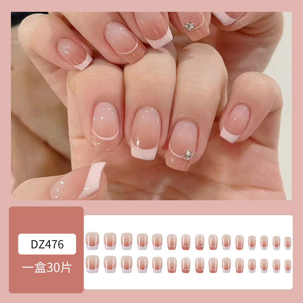 Uñas de desgaste hecho a mano al por mayor Pequeño Libro Rojo TikTok flash plata caliente mariposa pieza de uñas parche de uñas portátil