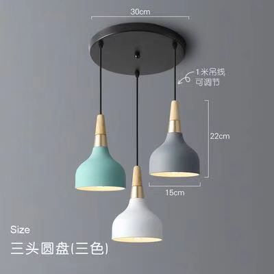 Candelabro de una sola cabeza Zhongshan, sensación avanzada, mesa de comedor de estilo cremoso creativo nórdico, lámpara de mesita de noche, araña de arte minimalista moderno