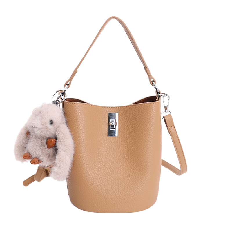 Bolso de nicho coreano portátil cubo de agua bolso para niños ventas calientes nueva textura de alta calidad lujoso ligero ocio versátil bolso de mochila