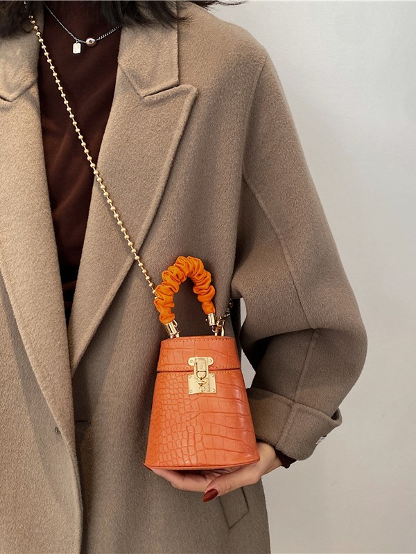 Bolso de mujer transfronterizo 2025 nuevo cocodrilo bolso de cubo bolso de hombro de cadena de moda europea y americana bolso de mano popular en línea