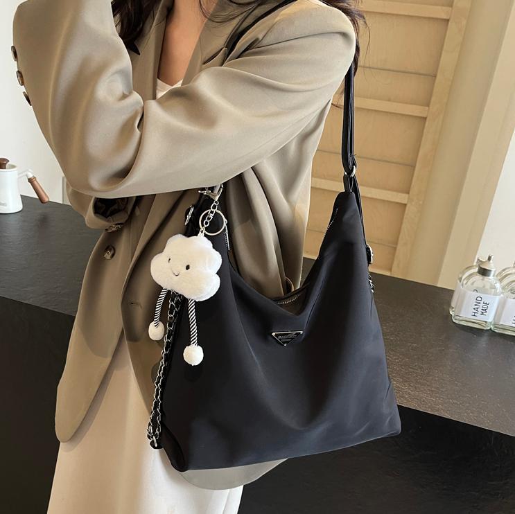 Transfronterizo superfire nylon gran capacidad tote bag2025 nuevo ocio versátil mochila simple mochila mujer
