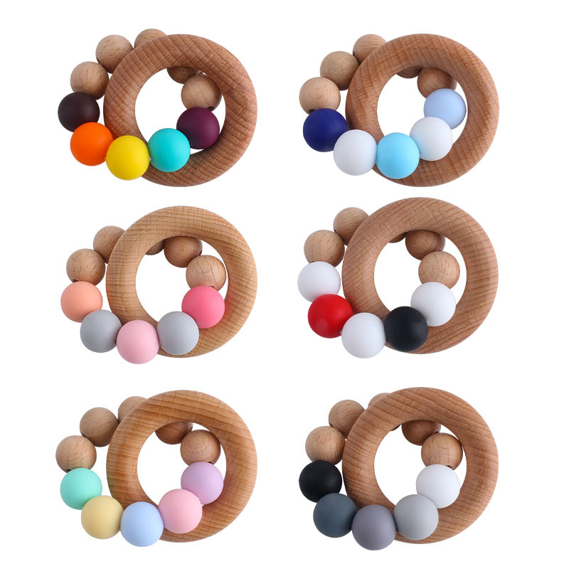 Nueva DIY creativo Beech anillo macaron color juguete teether bebé cuentas de silicona pulsera teether palo
