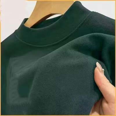 Half turtleneck German velvet top. Dark green