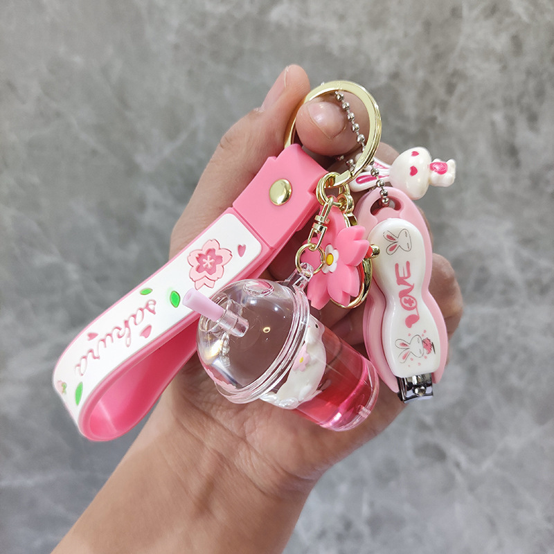 Cute Rabbit Doll Doll Men's and Women's Creative Cartoon Pendant Pendant Sand Bottle Oil Keychain Internet Celebrant Gift
