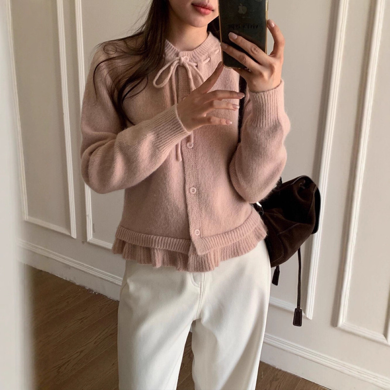 Autumn and Winter New Drawstring Collar Ruffled Edge Knit Cardigan Women's Round Neck Niche High-End Top Autumn and Winter New Drawstring Collar Ruffled Edge Knit Cardigan Women's Round Neck Niche High-End Top