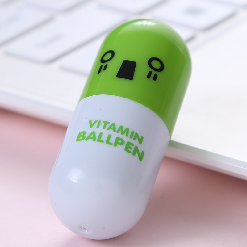 Nuevo mini cara sonriente emoji píldora bolígrafo plástico retráctil creativo rompecabezas estudiante papelería regalo al por mayor