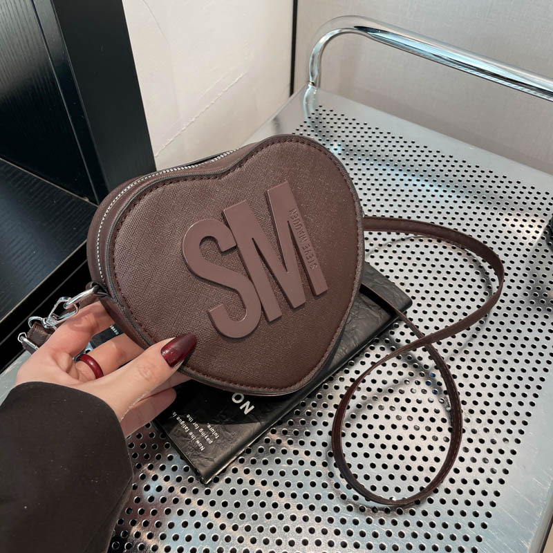 Bolsos para mujer 2025 Día de San Valentín Nuevo estilo Moda europea y americana Letras populares Color sólido Bolso en forma de corazón bags Bolso de hombro de moda