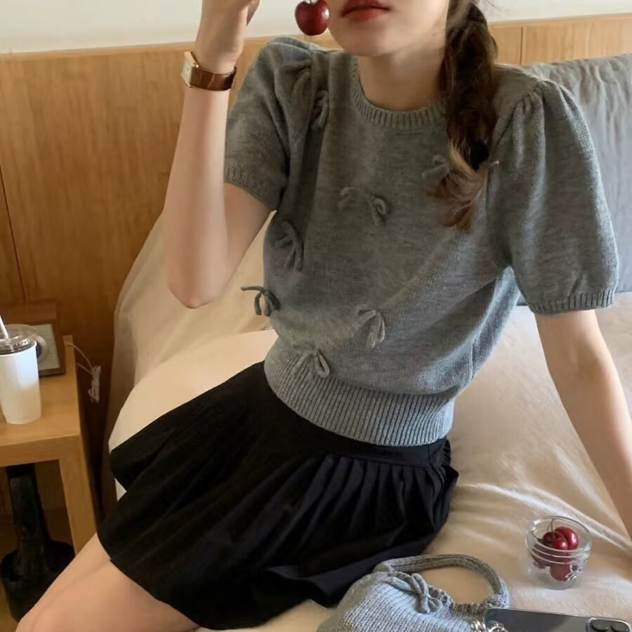 Summer cute elegant knitted sweater with bow with a round collar