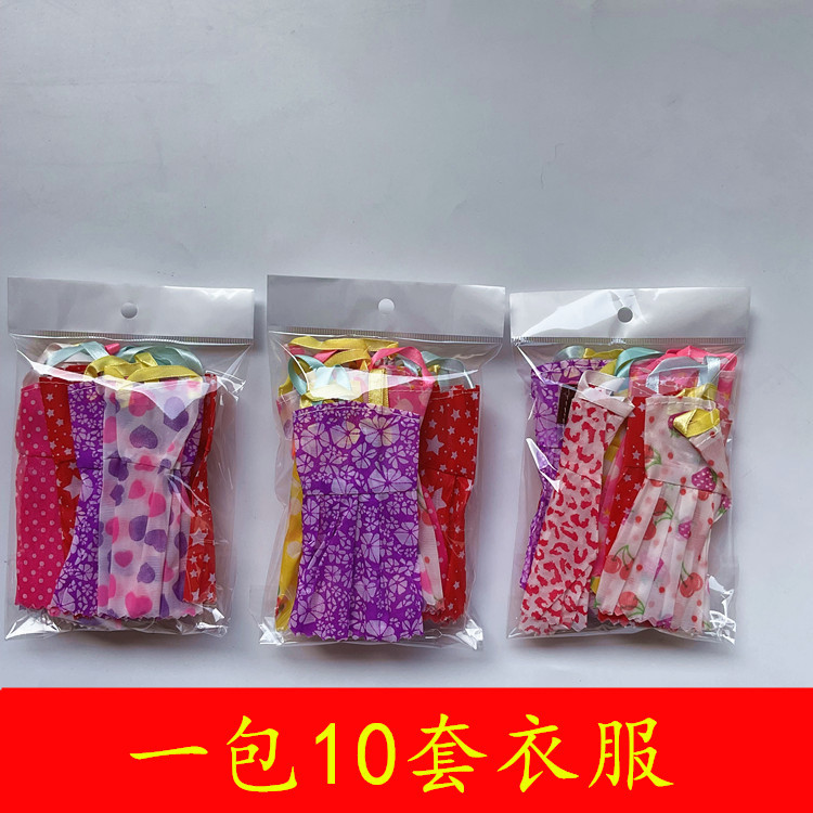 Venta al por mayor Yi Tian Barbie muñeca ropa cambiante pequeña falda a juego al azar vestido niña princesa transfronteriza