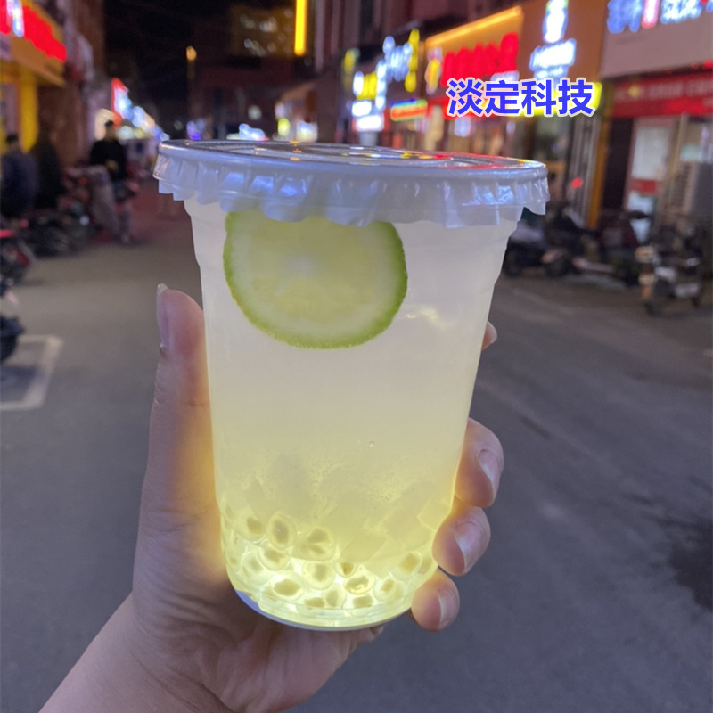 Internet celebridad ciudad coche puesto móvil tarde en la noche LED luminoso limón taza de té Fondo luz colorida botella de vino almohadilla luminosa