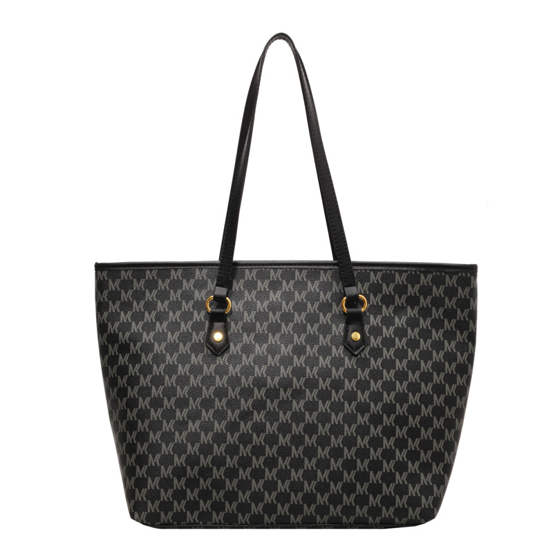 Bolsa de gran capacidad de dama de alta calidad 2025, nuevo tipo de bolso de hombro versátil, bolso de mano de viaje retro de moda