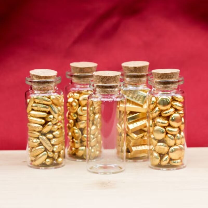 Gold-plated mini gold ingot and gold bean drifting bottle ornament, simulated glass wishing bottle, creative gift.