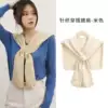 Knitted beige cloak