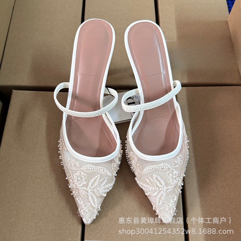 White embroidered high heels