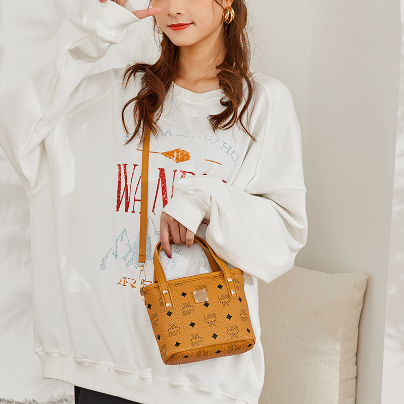 Guangzhou Bag2023 nuevo bolso de balde bolso de moda impreso bolso de mano de mujer retro bolso de hombro ocio