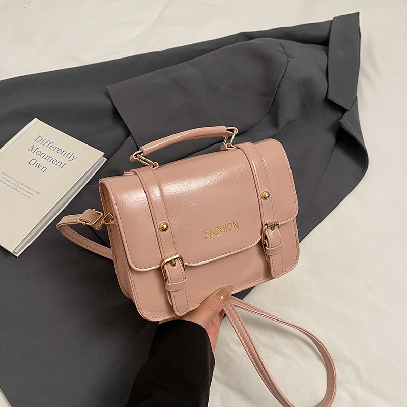 Bolso de mano retro británico para mujeres 2025, nueva moda, bolso cuadrado de color contrastante, bolso de mochila universal, primavera y verano, mujeres extranjeras