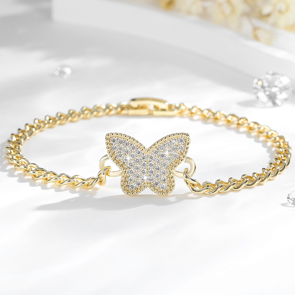 Explosiones transfronterizas de venta caliente pulsera mariposa O-chaîne conjunto de joyas de cobre 14K oro chapado collar de joyas al por mayor